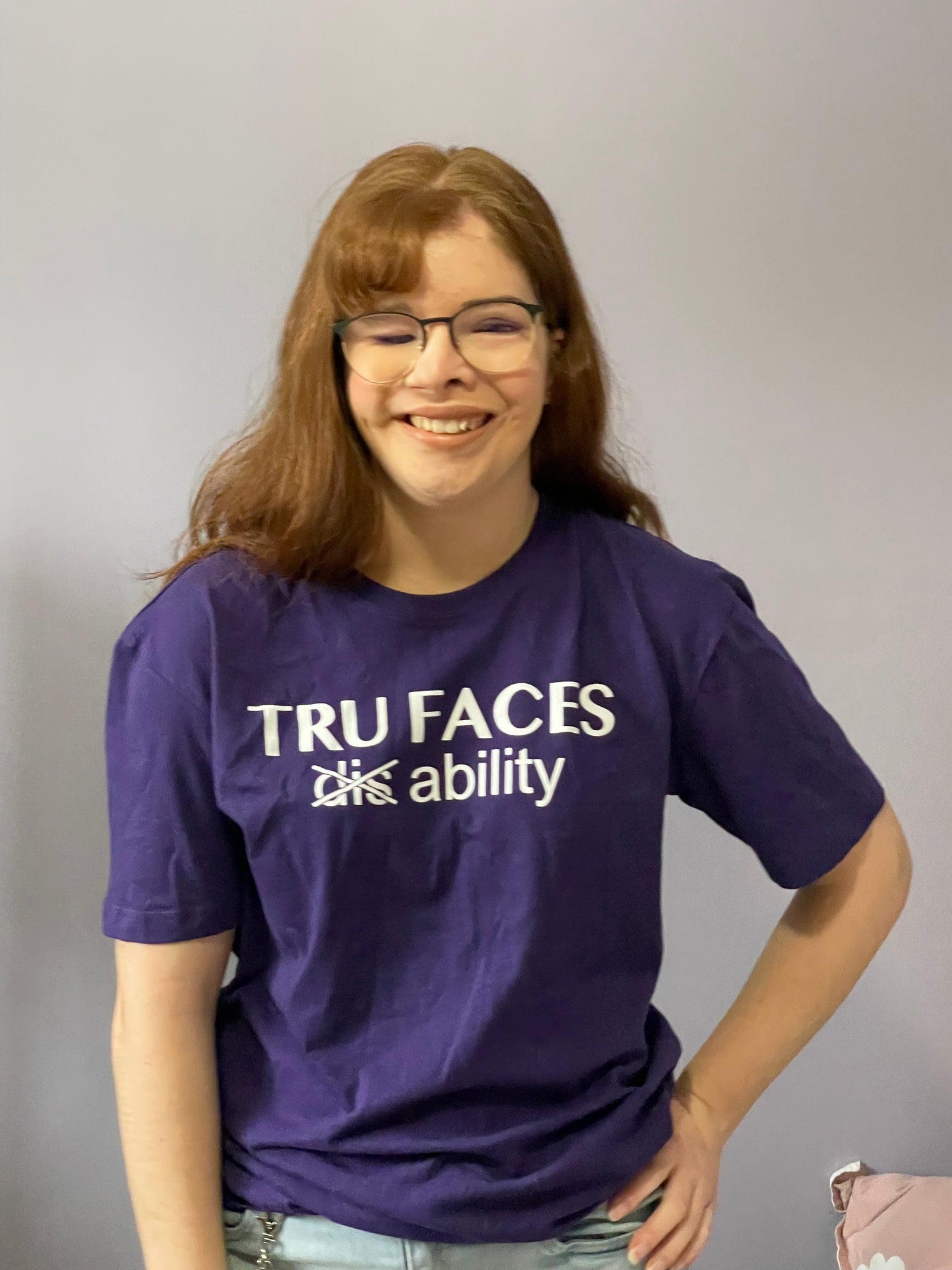 Hannah wearing a Tru Faces shirt